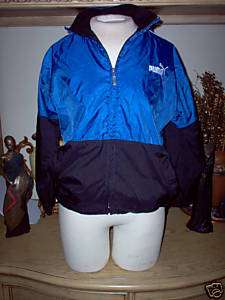Puma Black white & blue Jacket w/ 2 front pockets & zips. Large  