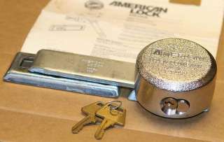 American 2000 hockey puck lock, 2 keys and bar hasp assy plus 