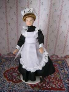 12th scale dolls house miniature female maid doll.  