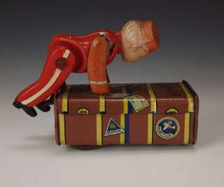Japanese Tin Plate & Celluloid   Bell Boy & Suitcase Toy  