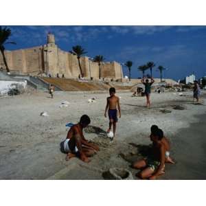 Children Playing on Beach in Front of Restored Fort Ribat, Monastir 