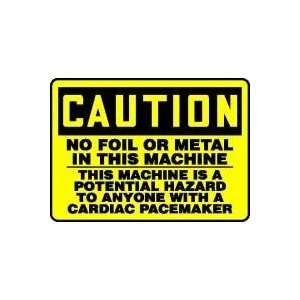  CAUTION NO FOIL OR METAL IN THIS MACHINE THIS MACHINE IS A 