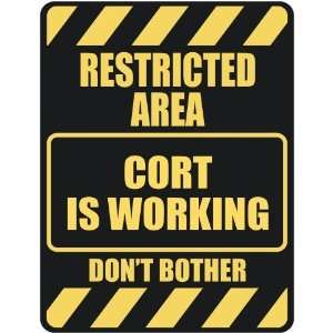   RESTRICTED AREA CORT IS WORKING  PARKING SIGN