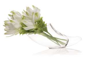 This beautifulsideways glass vase is shaped like a horn. It is a great 