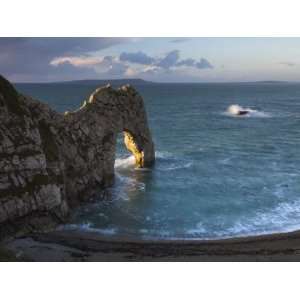  Archway of Durdle Door Glowing Golden in Early Morning 