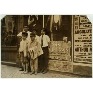   small boys sell newspapers in the Virginia cities.