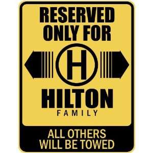   RESERVED ONLY FOR HILTON FAMILY  PARKING SIGN