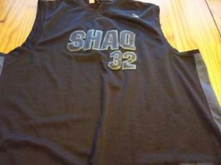 It has the word SHAQ and a basketball player logo sewn on the front 