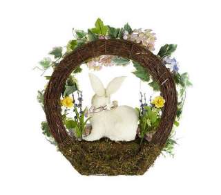  wears garland with flowers and eggs free standing base measures 19 x 5