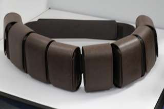 The belt width is 2 1/2inches.The dimension of the pouches is 4 x 2 1 