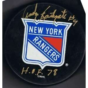 com Andy Bathgate Autographed Puck   NY NHL HOF 78   Autographed NHL 