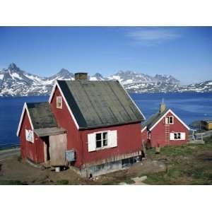  Wooden Houses on the Coast, with Mountains in the 