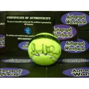John McEnroe autographed Tennis Ball (Practice ball with black marker 