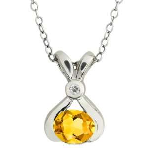  0.64 Ct Oval Yellow Citrine and White Topaz 18k White Gold 