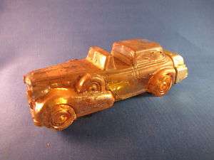 AVON AFTER SHAVE BOTTLE COLLECTIBLE GOLD CADILLAC  