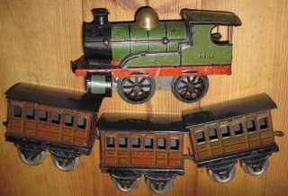you are bidding on an early tinprinted hornby o gauge train set all 