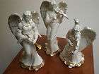 MIKASA PORCELAIN SET OF THREE ANGELS, CREAM AND GOLD