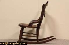 An authentic Victorian period childs rocking chair dates from about 