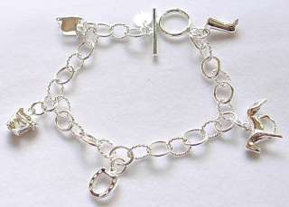 Silver Plated horse saddle boots charms bracelet  