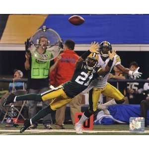 Charles Woodson Action from Super Bowl XLV Finest LAMINATED Print 