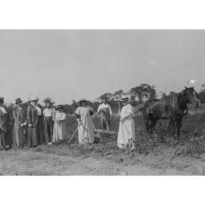   photo Mrs. T.B. Wells, Mrs. D.A. Palmer & Mary G. Hay suffrage farmers