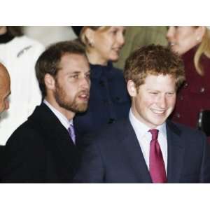 Prince William, sporting a new beard, with his brother Prince Harry as 
