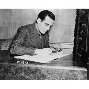  1938 photo Samuel Barber, seated, making notes on his 