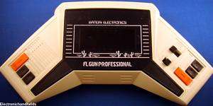 FL GUN PROFESSIONAL electronic handheld game by Bandai. (1980s 