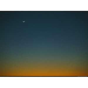 Crescent Moon Hangs High in a Twilight Sky Premium Photographic 
