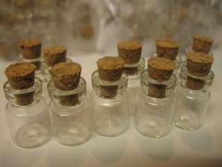 small glass vials with cork tops. 0.5ml tiny bottles. Empty clear jars 