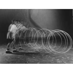  Multi Exposure Shot of a Boy Playing with a Hula Hoop 
